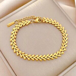 18K GOLD DIPPED INTERLOCKING V SHAPED PIECES SMOOTH AND SHINY BRACELET